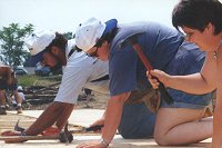 volunteers building house